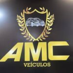 logo amc veículos